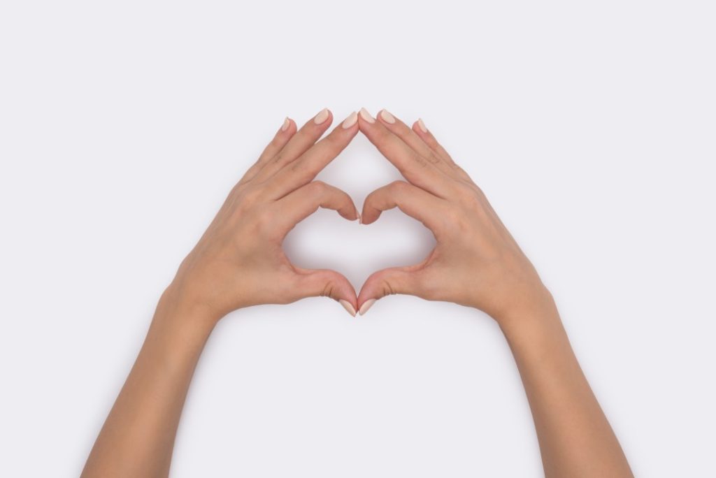 Two hands in the shape of a heart