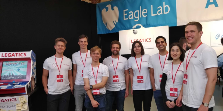 8 members of the Legatics team at LegalGeek