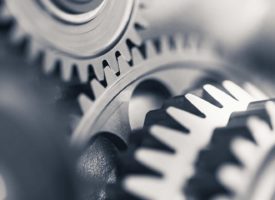 An extreme close up of interlocking gears